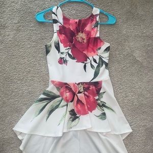 Peplum top with long back